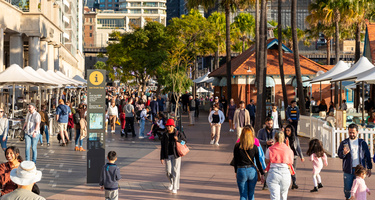 A street market with lot of people roaming around